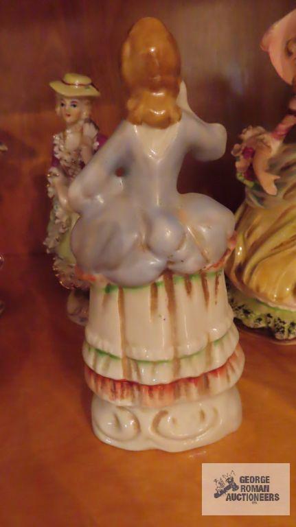 Victorian figurines, small trinket boxes, and vases