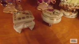 Victorian figurines, small trinket boxes, and vases