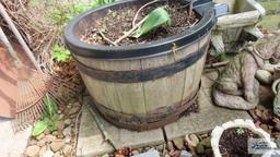 Wooden barrel planter with plastic insert