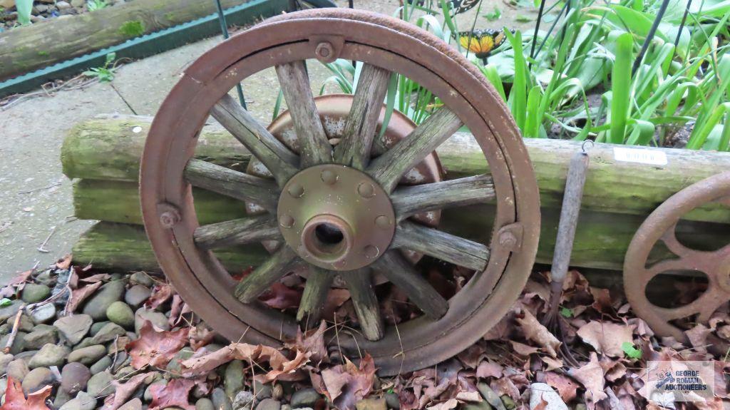Three antique wheels