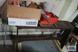 Wooden sofa table, painting supplies and spray cans