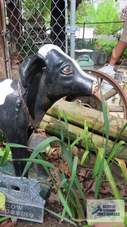 cow concrete figurine, cow crossing sign, and bell. Approximately 2.5 foot tall