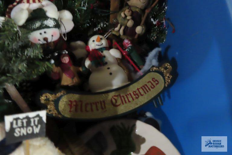 Tote with snowman decorations, snowman ornaments, wax burners, wind chimes, etc