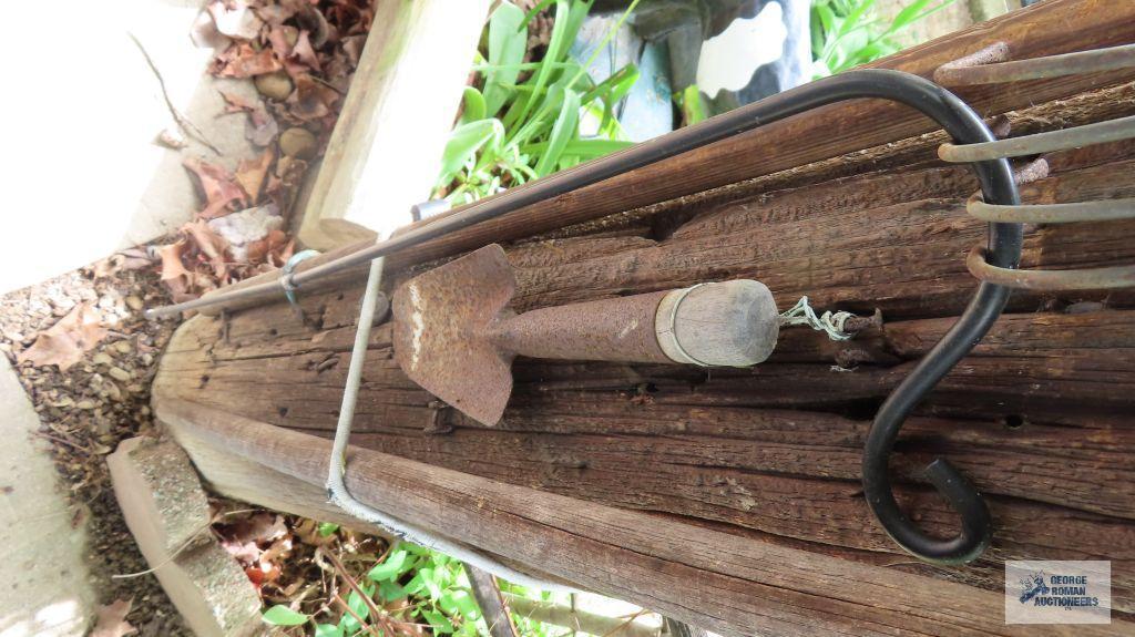 Lot of scoops, antique sand shovel toys, wooden birdhouse and antique tools