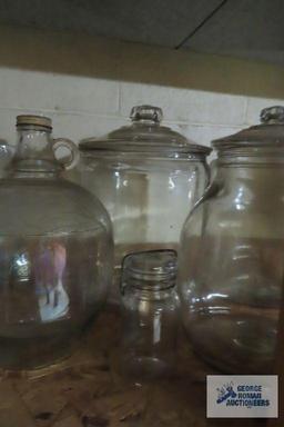 Large glass canisters, vases, and jugs