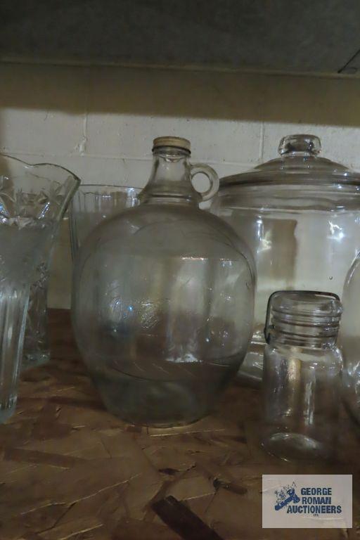 Large glass canisters, vases, and jugs