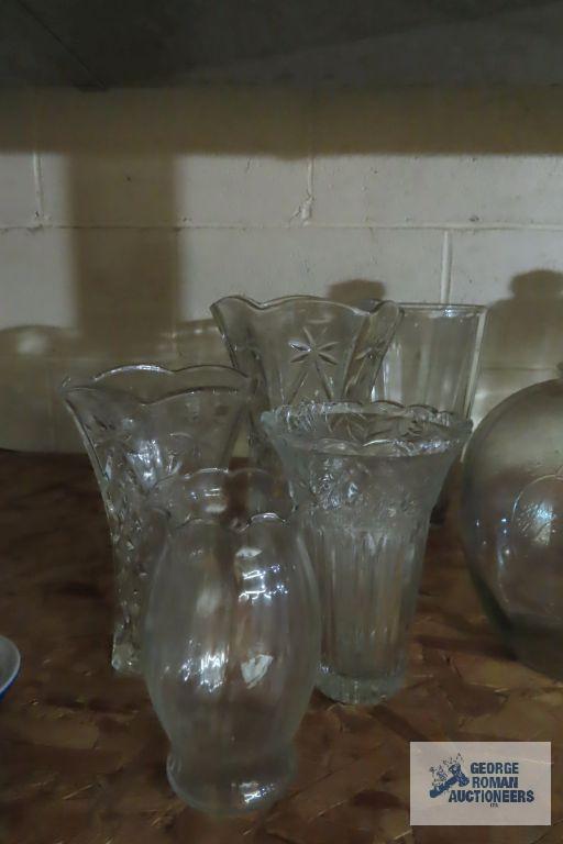 Large glass canisters, vases, and jugs