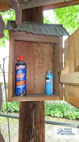 Homemade outdoor wooden storage box. Bring tools for removal