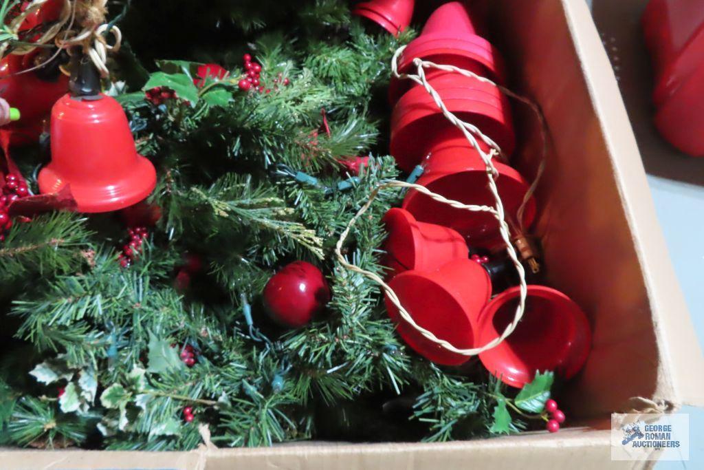 Christmas lights, lighted swag, plastic lighted bells, wreaths, garland, etc