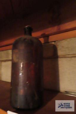 Large brown hydrogen peroxide bottle