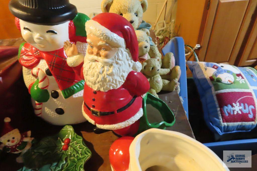 Christmas decorations including angels, holly plate, Santa boot, Sana snowman