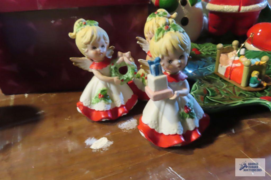 Christmas decorations including angels, holly plate, Santa boot, Sana snowman