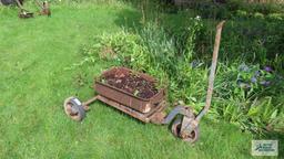 Antique industrial roll about cart with planter