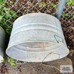 Two metal wash tubs