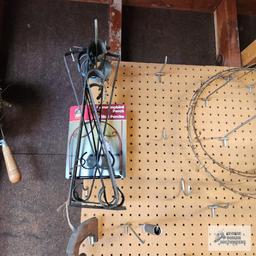 Lot of small hand saws, retractable dog leash, hardware and etc