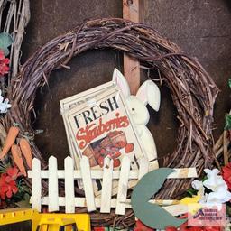 Lot of decorative wreaths, fresh strawberry metal signs and wrought iron flag holder