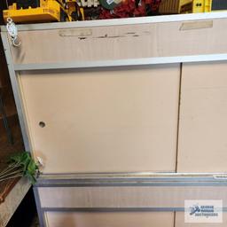 Two storage cabinets, approximately five foot long