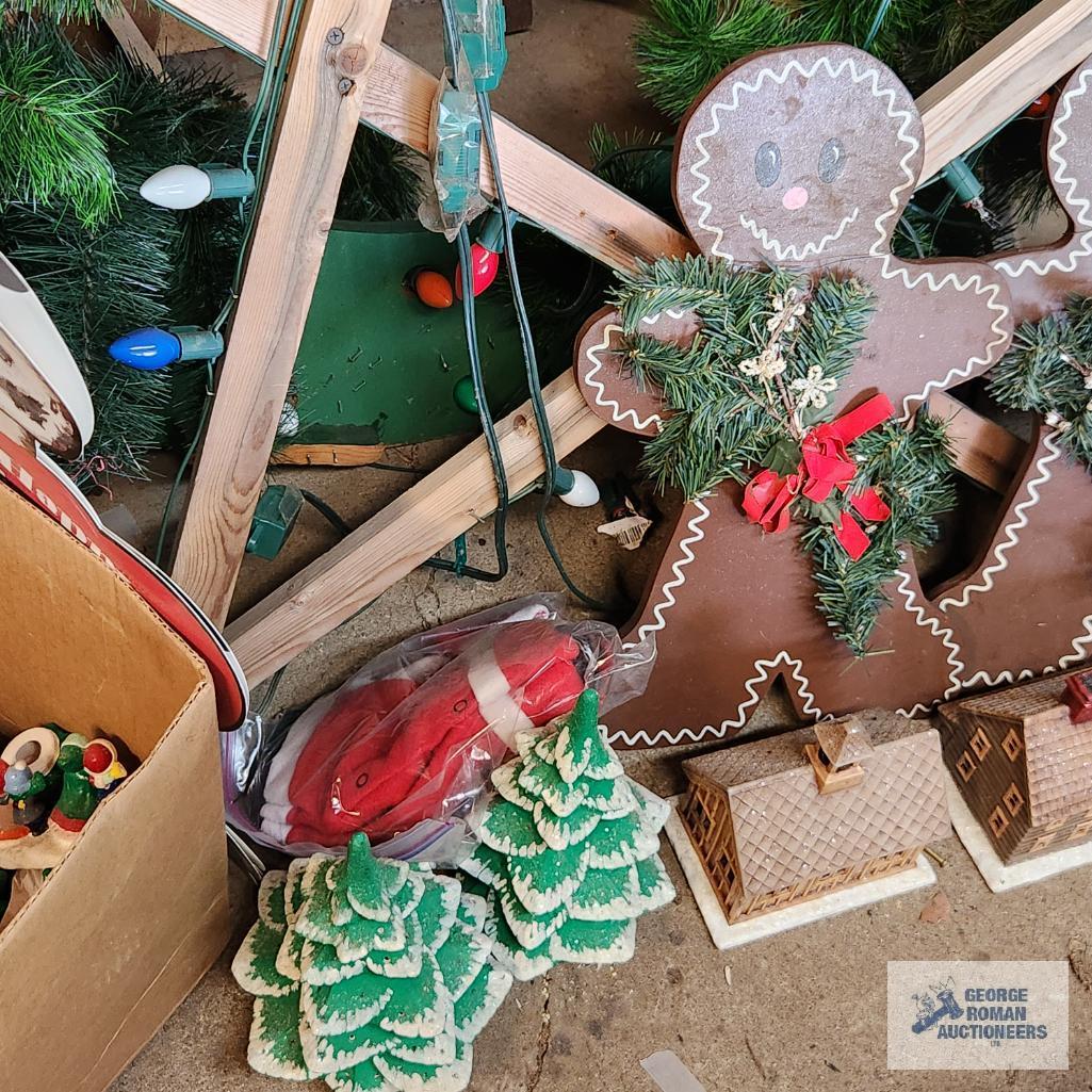 Lot of wooden Christmas decorations and ceramic Christmas houses