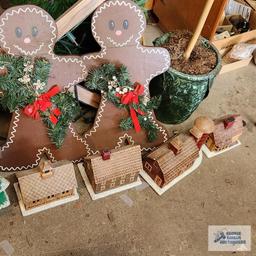 Lot of wooden Christmas decorations and ceramic Christmas houses