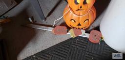 Lighted pumpkin and wooden Halloween decoration