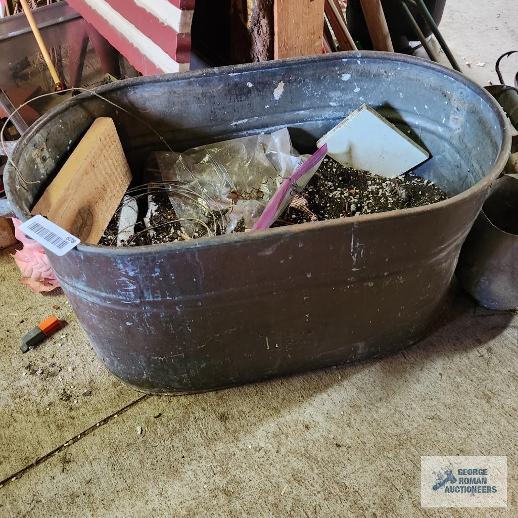 Copper boiler converted into a planter. Must take potting soil and contents