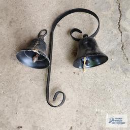 Two small bells. One has a hanger