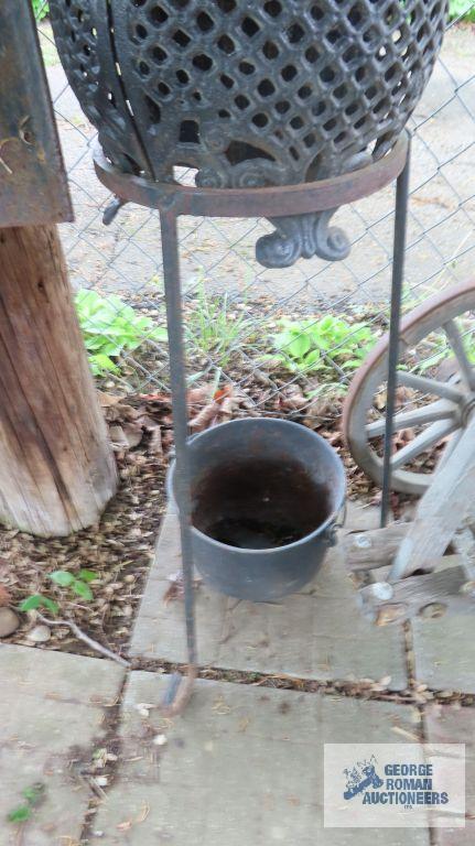 Cast iron cauldron and cast iron planter with stand