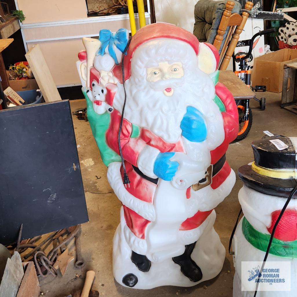 Santa Claus plastic lighted outdoor decoration, approximately 4 ft tall