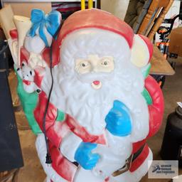 Santa Claus plastic lighted outdoor decoration, approximately 4 ft tall