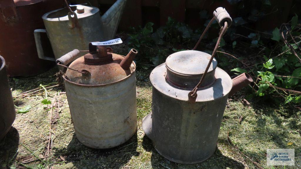 Vintage metal watering cans