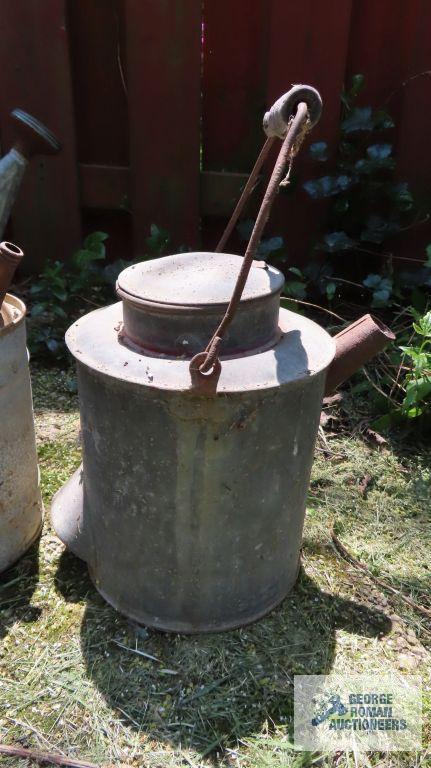 Vintage metal watering cans