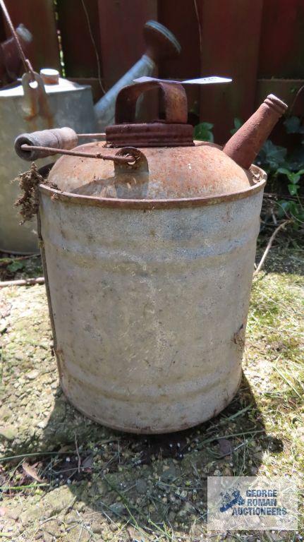 Vintage metal watering cans