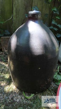 Dark brown pottery jug