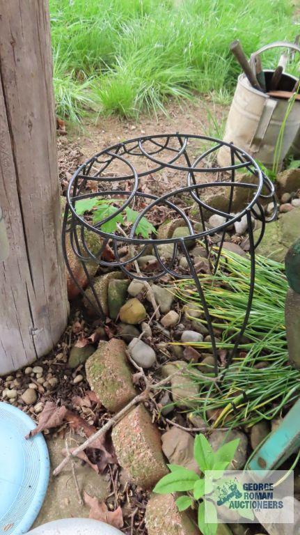 Lot of wooden and metal chairs, birdhouse, pitchfork, and children swings