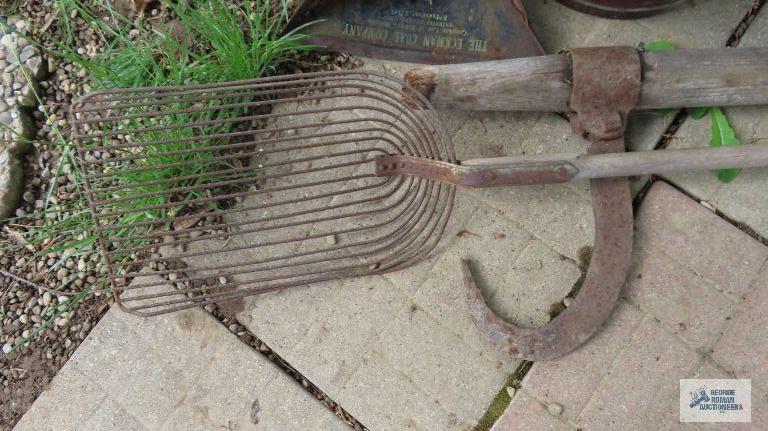 Antique log roller, advertising dustpan and stall shovel