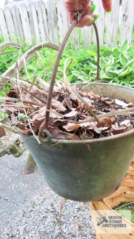 Three plastic baskets. One includes a copper bucket.