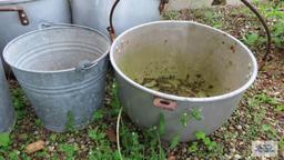 Lot of aluminum pots and metal buckets