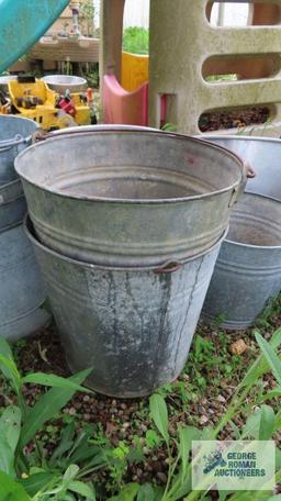 Lot of aluminum pots and metal buckets