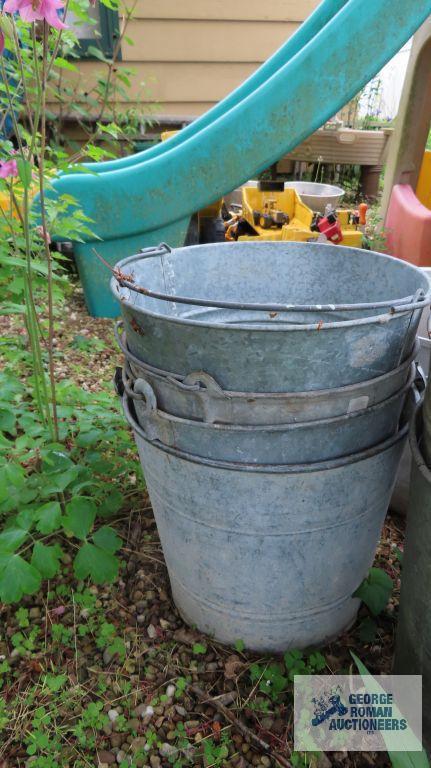 Lot of aluminum pots and metal buckets