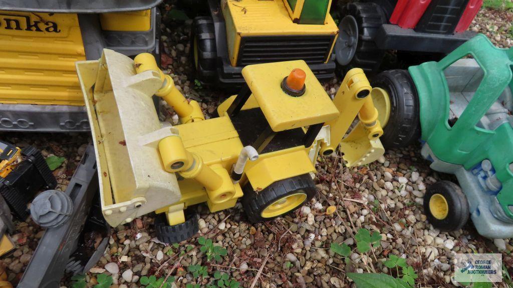 Lot of Tonka trucks and other toys