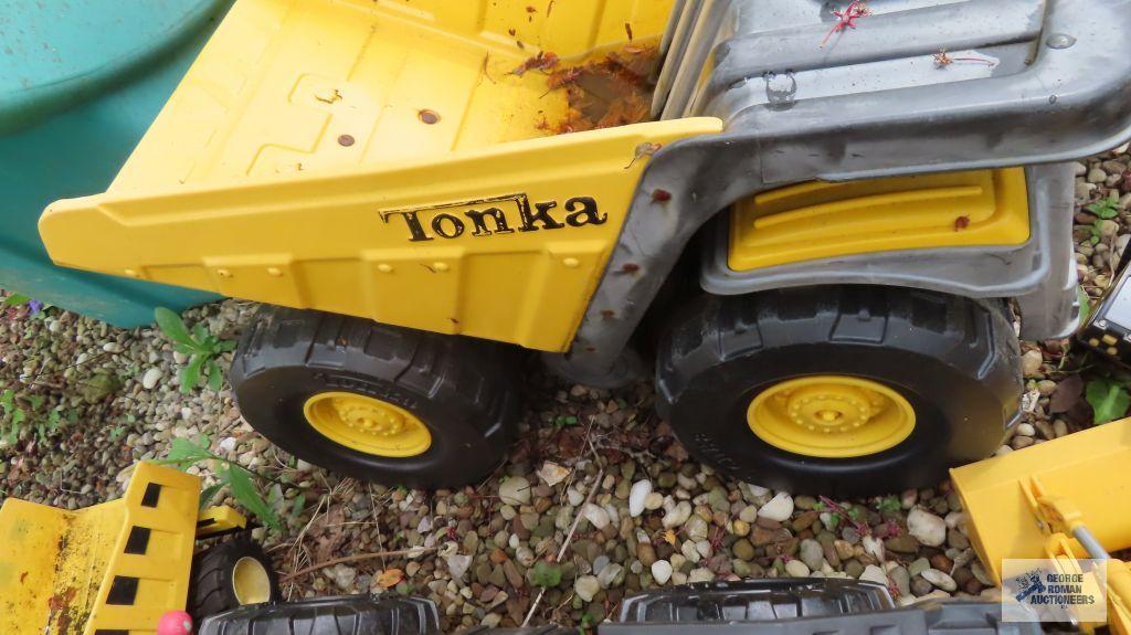 Lot of Tonka trucks and other toys