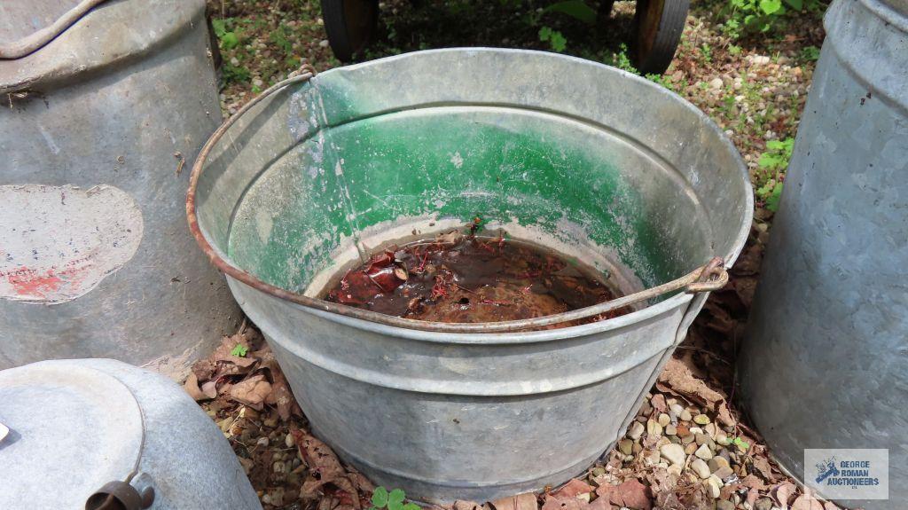 Hammered aluminum kettle, chicken feeder parts, and metal buckets