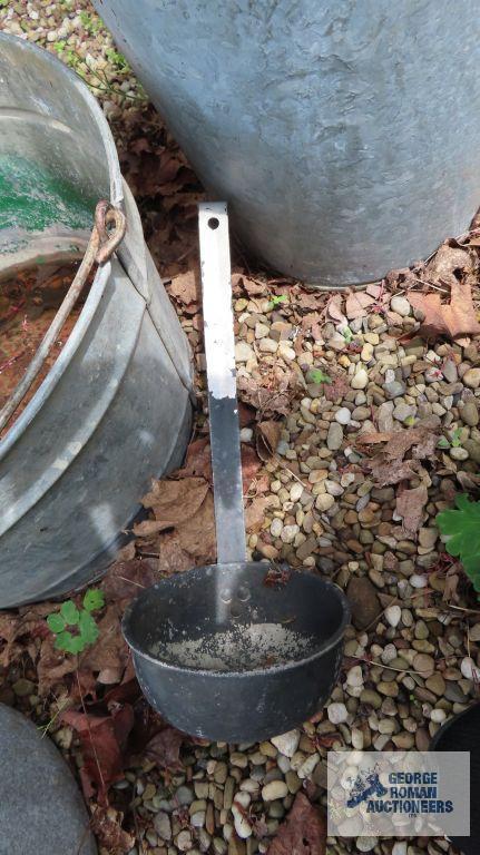 Hammered aluminum kettle, chicken feeder parts, and metal buckets