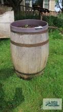 Wooden barrel with planter