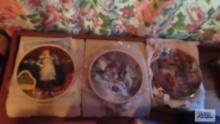 Two Royal Doulton hanging plates and three Knowles plates of the old west