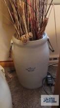 Crown 6 gallon crock with wire handles and contains reeds