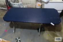 Small folding table, approximately 18 in by 3 ft