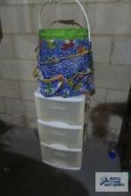 Three drawer plastic storage cabinet and crafting bucket