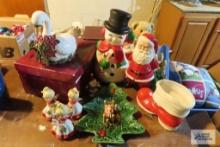 Christmas decorations including angels, holly plate, Santa boot, Sana snowman