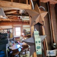 Three metal star decorations and decorative wooden box